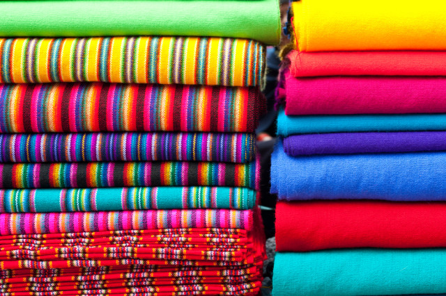 Ecuador Otovalo Market textiles Boyd Hendrikse shutterstock_177766172