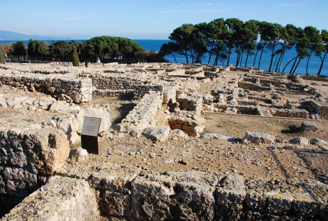 L2F Mar 17 pic Spain Catalonia Girona Empuries ruins with trees sea shutterstock_8673715