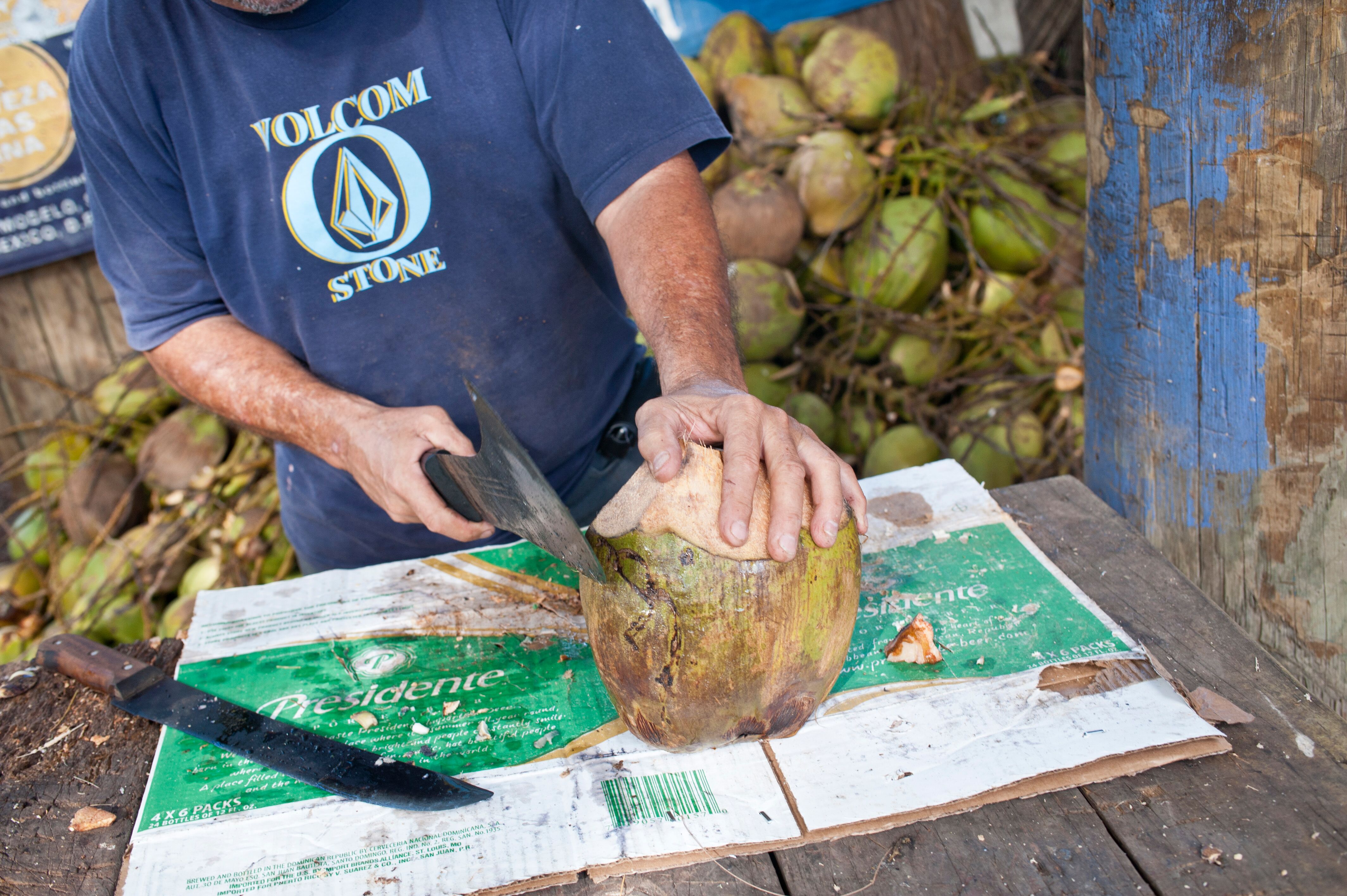 L2F May 19 pic Puerto Rico dining travel book machete chopping coconut