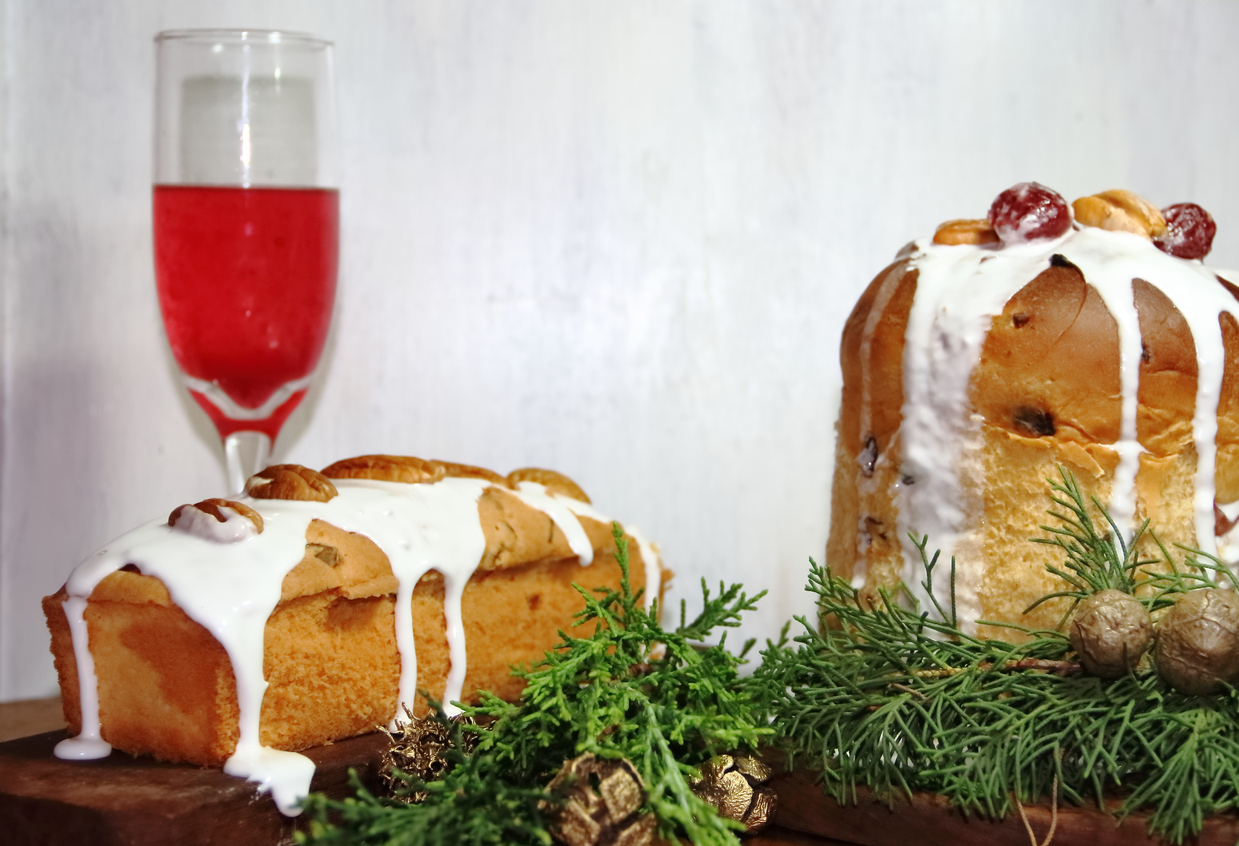 sweet bread Christmas pudding cin dried and glazed fruits and sparkling beverages