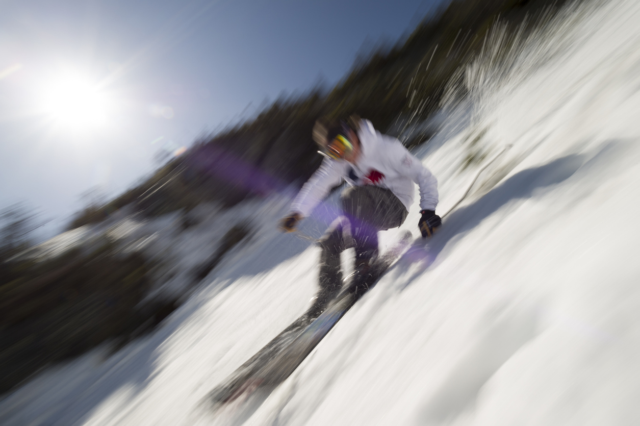"Motion blurred image of an expert skier, Stowe, VT, USA"
