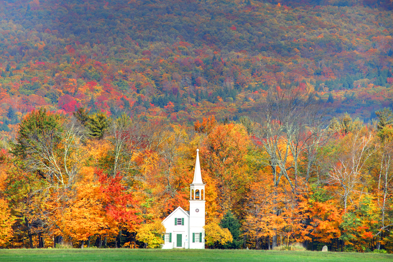 Quintessential fall New England in the small town of Wonalancet, New Hampshire. Photo taken of the vivid colors during the peak fall foliage season. New Hampshire is one of New England's most popular fall foliage destinations bringing out some of the best foliage in the United States