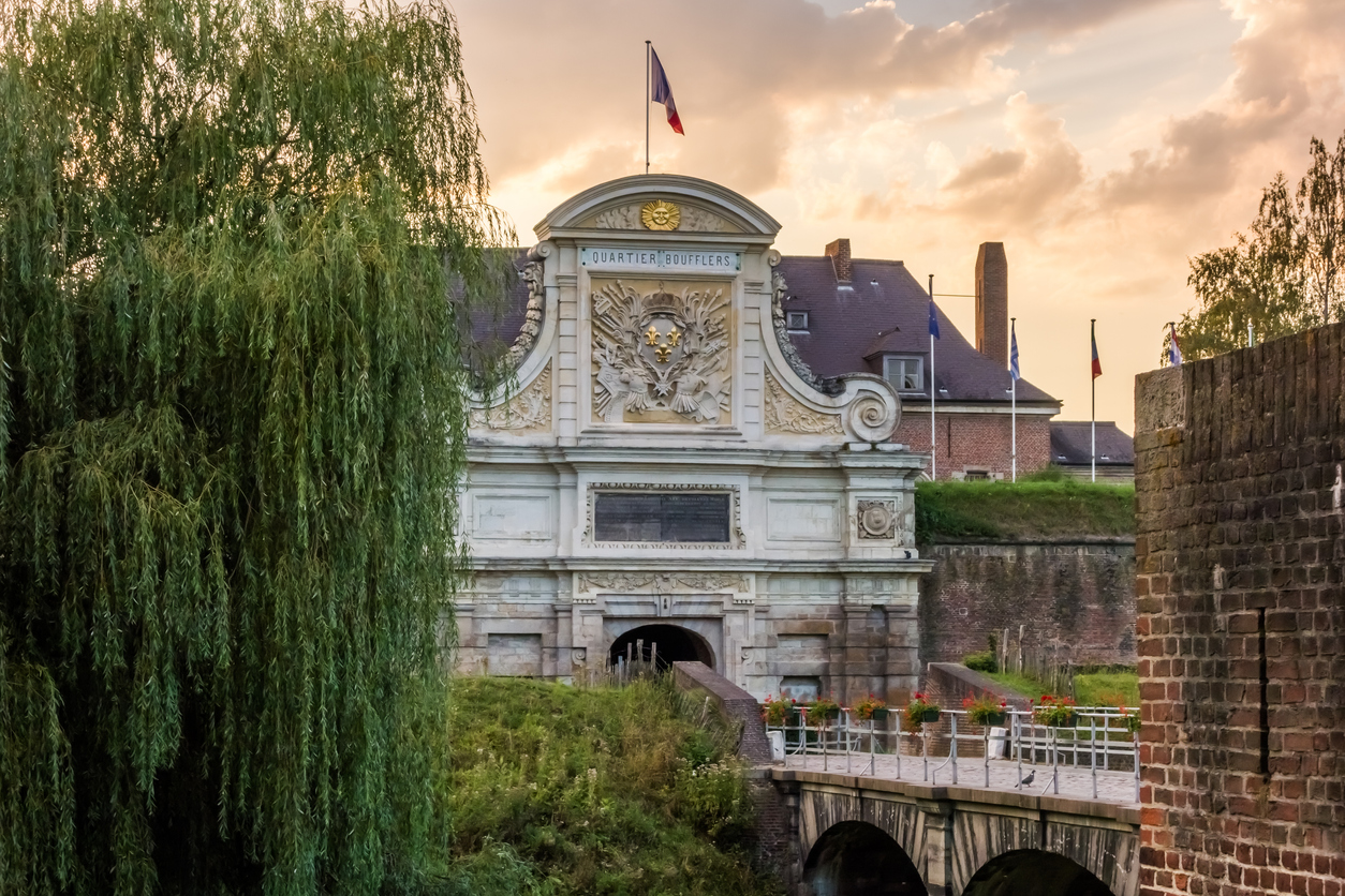 Lille, France - September 5, 2013: The historic gate to the Quartier Boufflers at the medieval citadelof Lille, being one of the towns landmarks and home to the Rapid Reaction Corps of France.